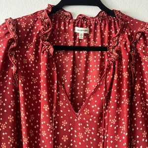 Dress in a flower print. Never’ve  been worn. Size M